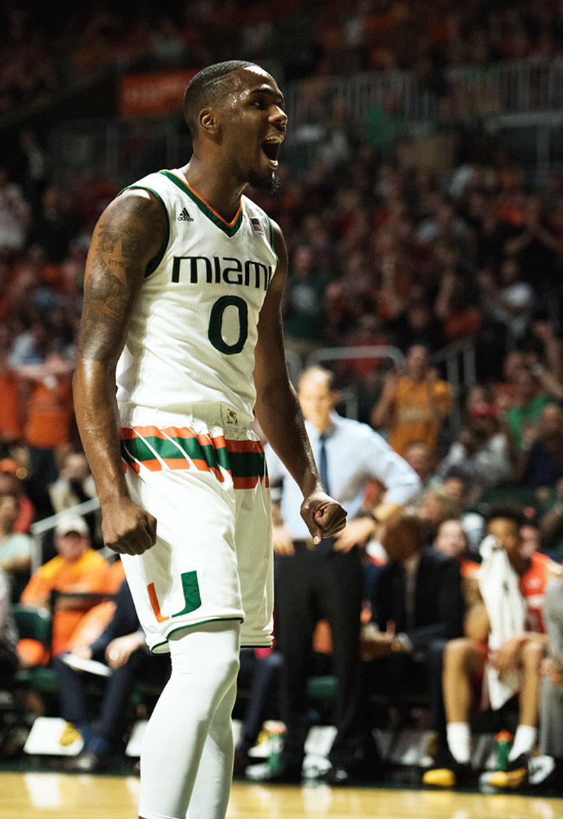 Newton clenches his fists and screams toward the crowd. He came off the bench to score 14 points, going 3-of-5 from the field and hitting 6-of-10 free throws. 