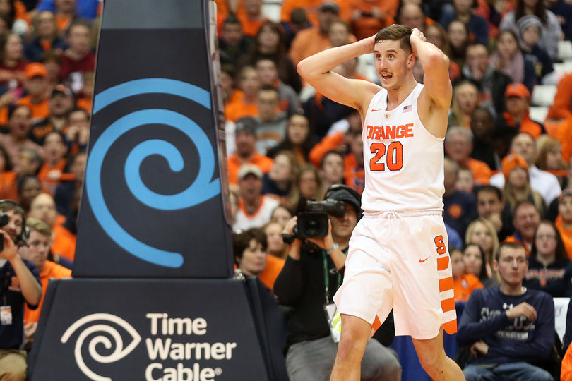 Lydon holds his hands on his head. The true freshman played 21 minutes in Syracuse's win.
