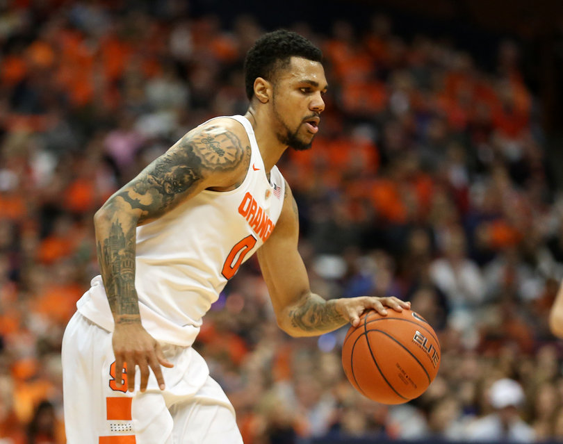 Gbinije dribbles the ball with his left hand in the SU win on Thursday night.