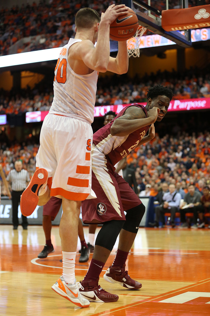 Lydon tries to save a ball from going out of bounds. He stands with his right foot inside the baseline.