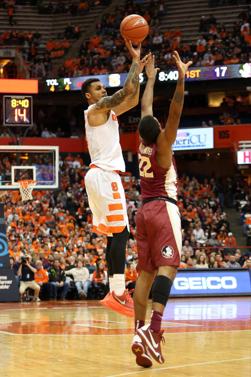 Gbinije launches a 3-pointer in the Carrier Dome on Thursday night. He played 36 minutes in the contest.