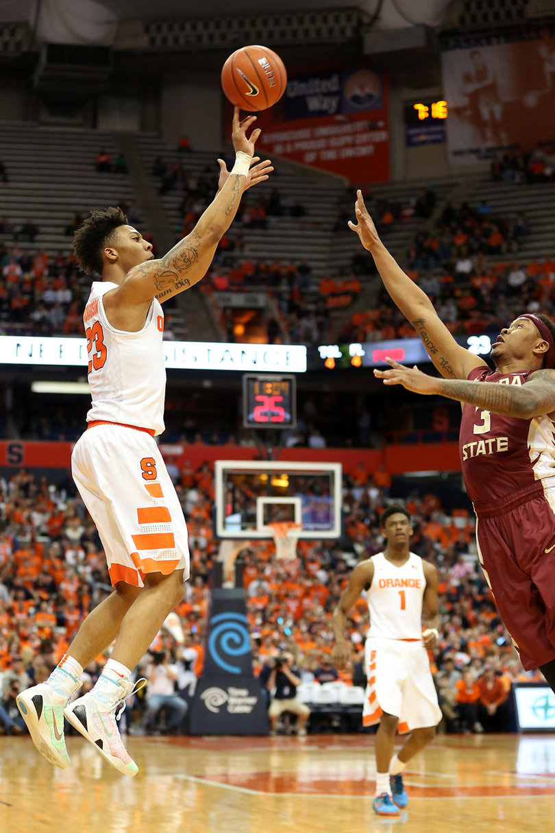 Richardson bends his legs while unloading a deep shot with a hand in his face. He went 6-of-10 from the field against FSU.