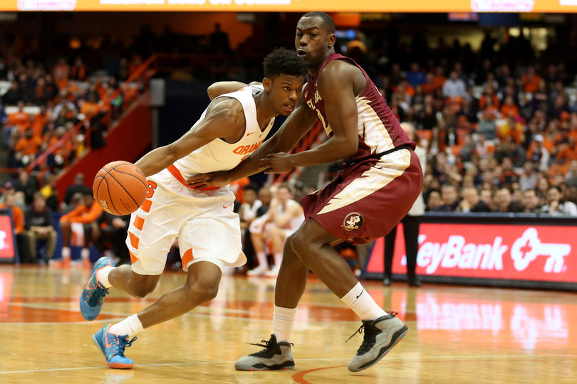 Frank Howard penetrates the lane while dribbling the ball with his right hand. Howard played 14 minutes. 