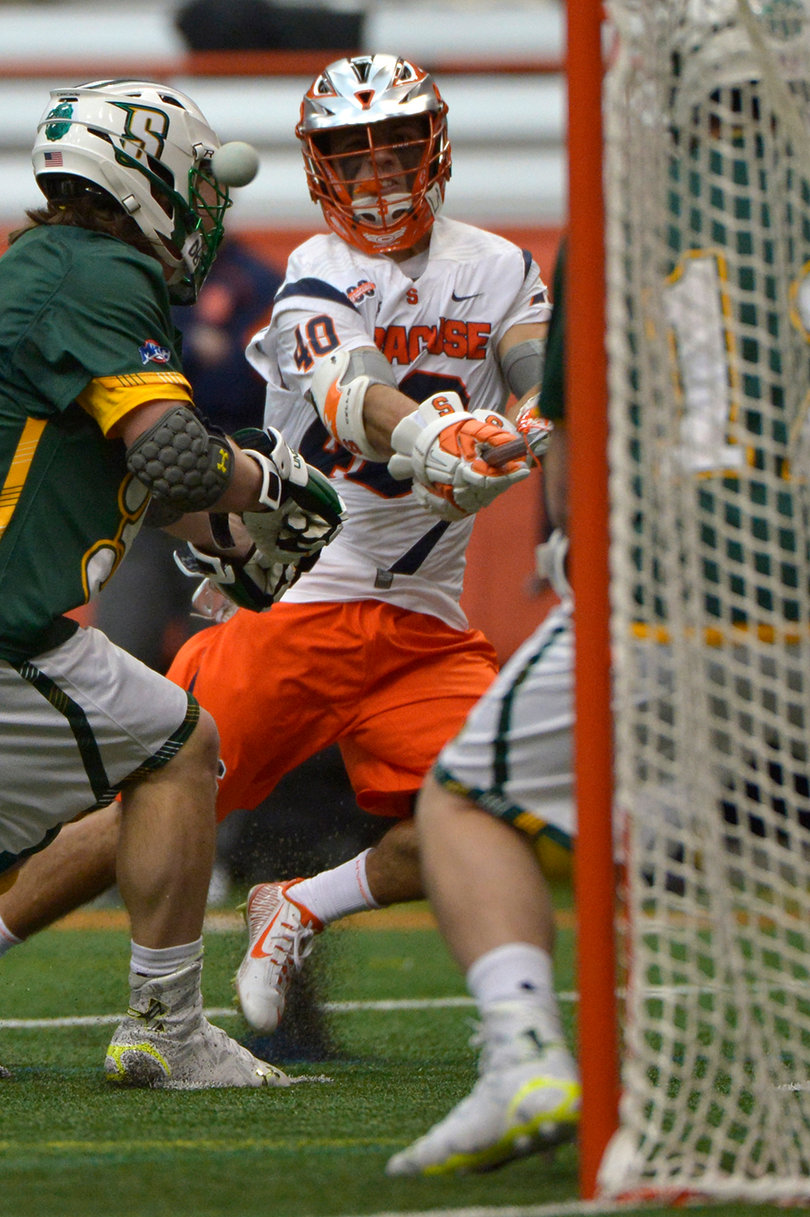 Sergio Salcido looks on as a ball flies past a Siena defender. Salcido scored two goals on Saturday.