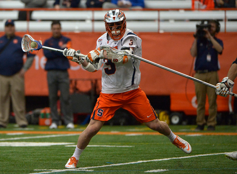 Nate Solomon winds up for a righty sidearm shot. The freshman got into the game after SU had a comfortable second-half lead.