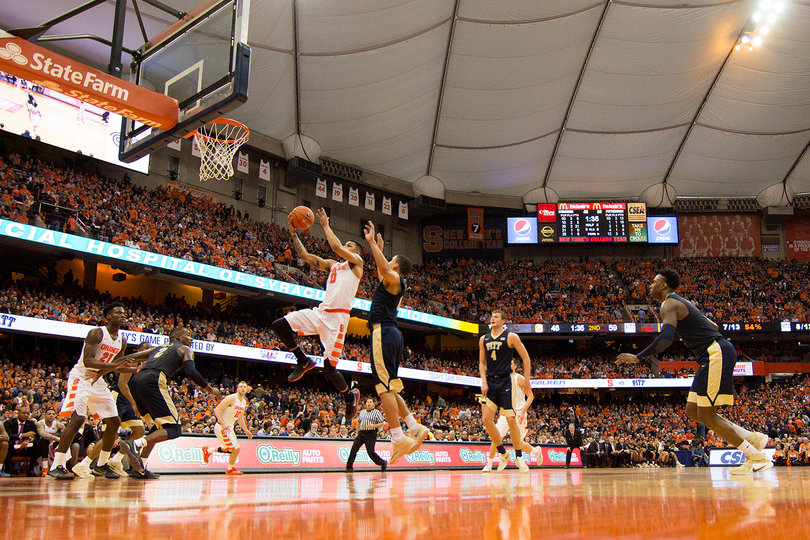 Michael Gbinije attacks the rim to attempt a layup on Saturday. The graduate student had 10 points in the loss. 
