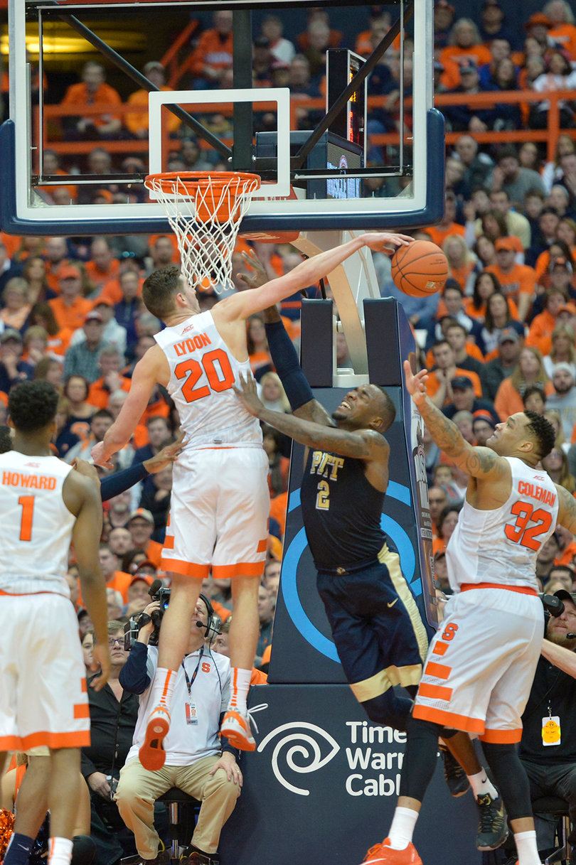 Freshman Tyler Lydon tips the ball underneath the backboard. Lydon scored a career-high 21 points and was Syracuse's only player to score more than 10.