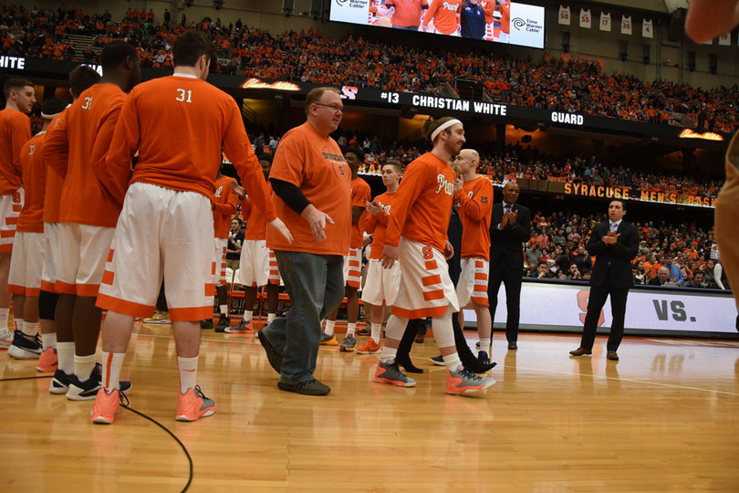 Rochester, New York native Christian White is honored during the pregame senior day festivities. 