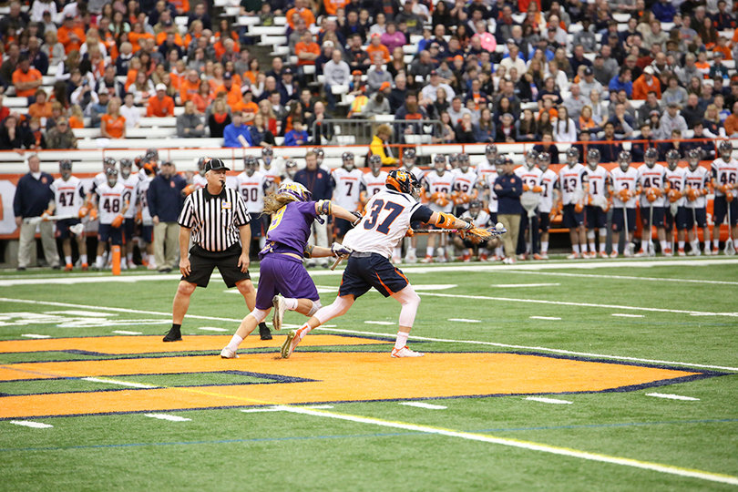 Williams escapes from the faceoff X with possession of the ball. His dominance allowed Syracuse to break open its big lead.