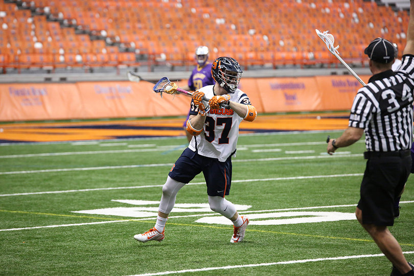 Faceoff specialist Ben Williams controls the ball. He won 17 of the 24 faceoffs he took.