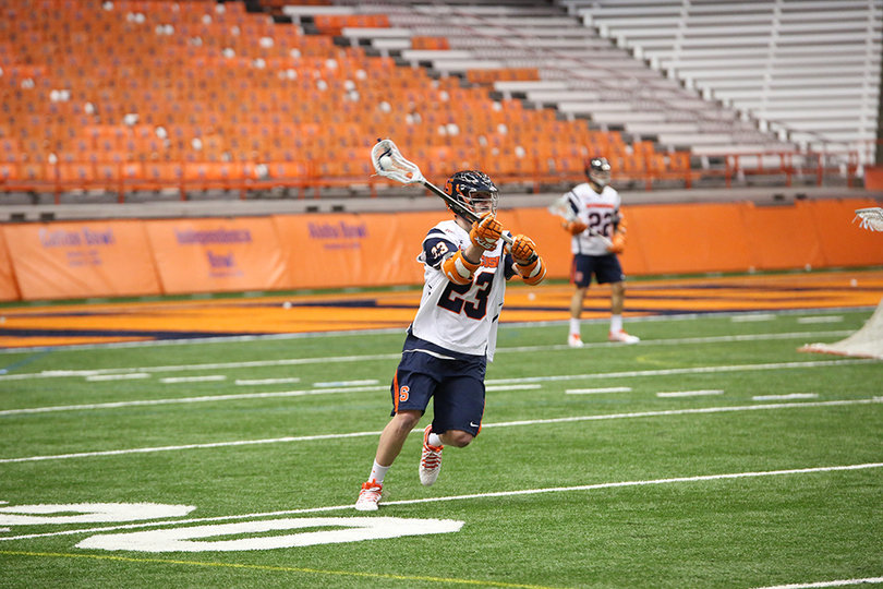 Junior attack Nick Mariano moves the ball to a teammate. He scored a hat trick against the Great Danes.