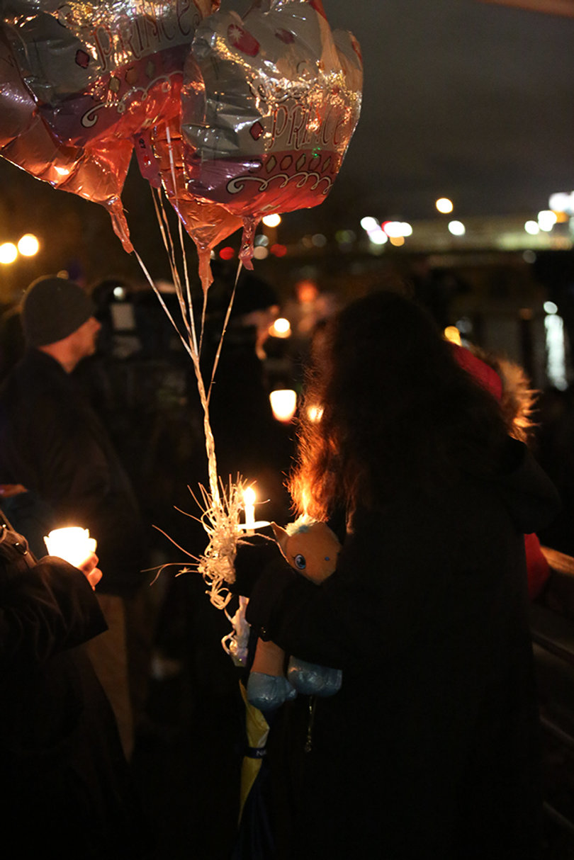 The amphitheater was decorated with balloons Wednesday night, and community members who attended were each given candles. 