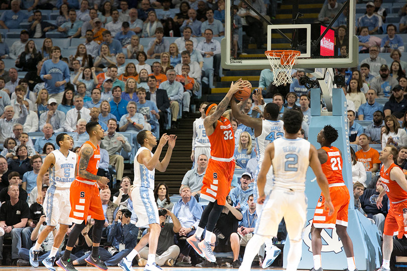 Coleman looks to grab a rebound at the Dean E. Smith Center on Monday night.