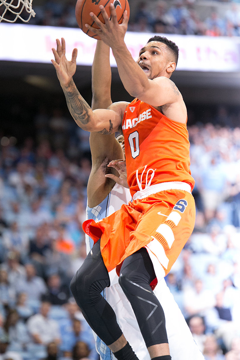 Gbinije attempts a lefty layup in the first half. 