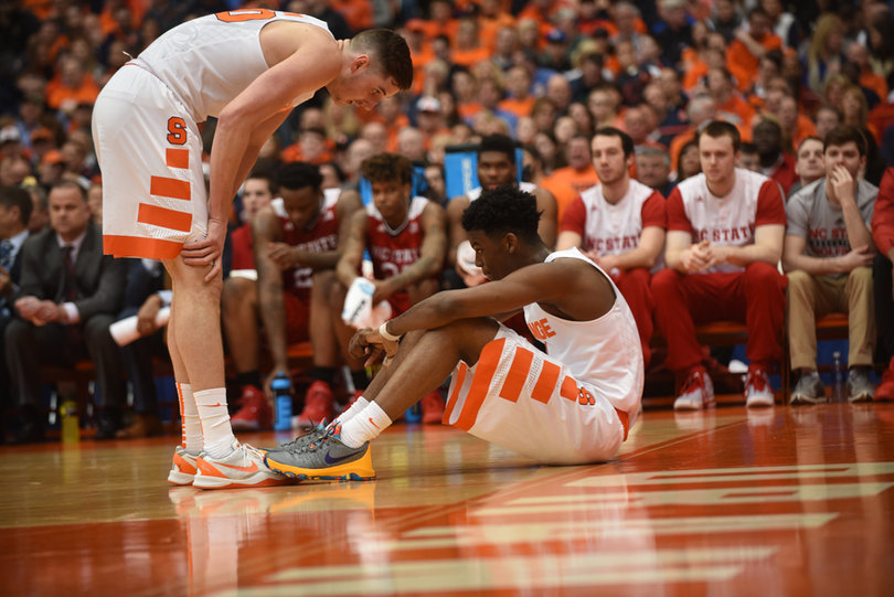 Lydon bends down as Howard sits on the court. Howard played 11 minutes, scored one point and assisted on two baskets. 