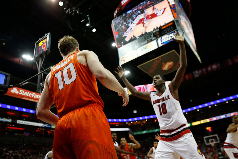 Cooney looks to inbounds the ball at KFC Yum! Center. He had 19 points in the contest.