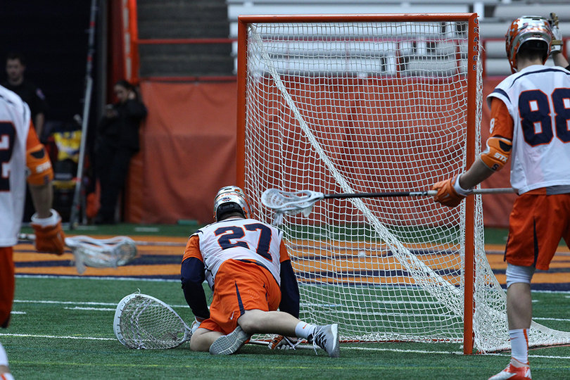 Hill lunges for a shot that missed the goal wide left. 