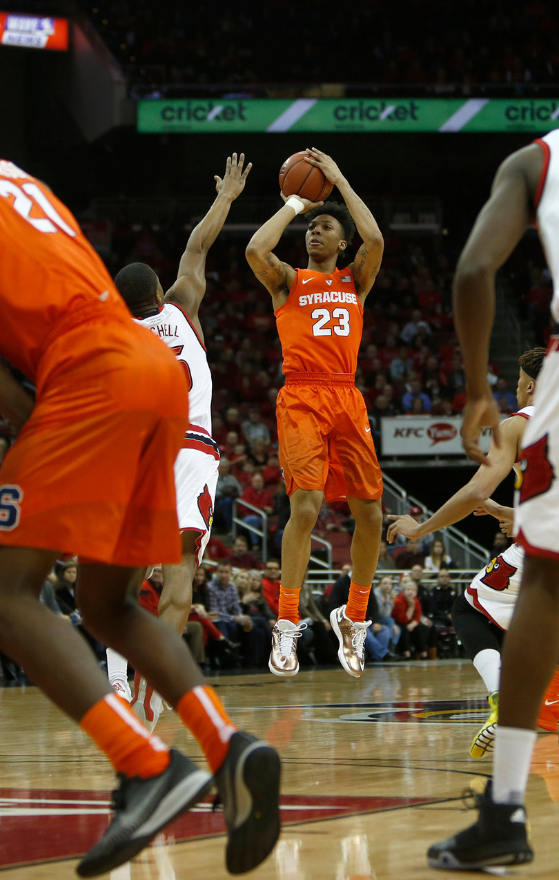 Richardson shoots over UofL guard Donovan Mitchell. He scored 10 points and scraped together two assists. 