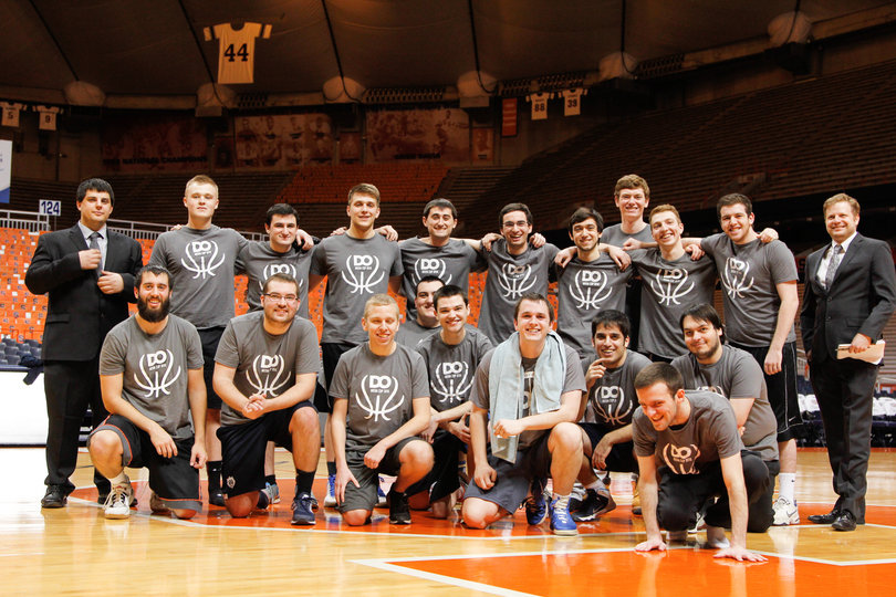 The 2016 D.O. Media Cup team poses at center court.