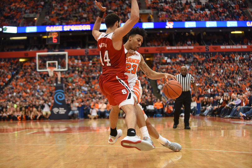 N.C. State's Caleb Martin guards Richardson, who turned the ball over four times. 