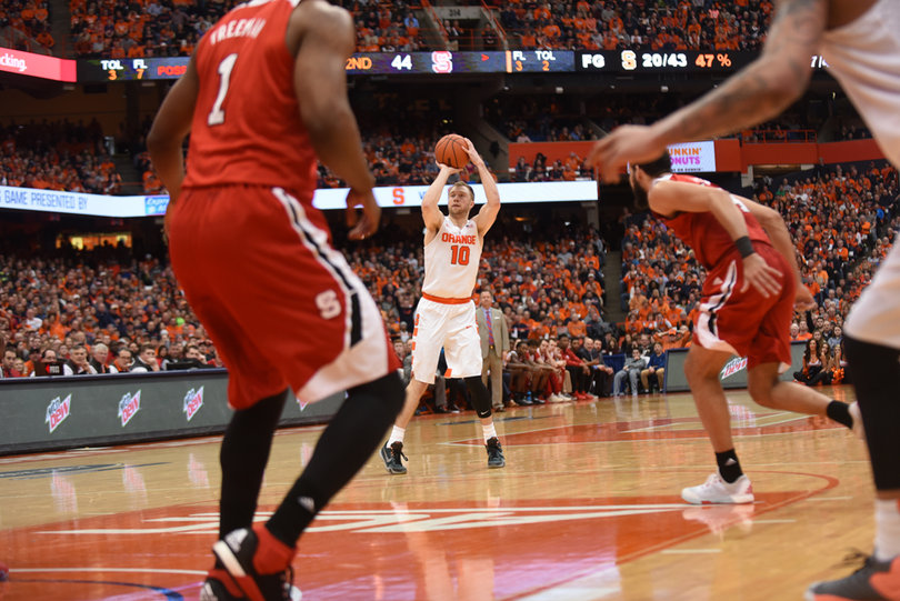 Cooney launches a 3-point shot during the Orange's matchup with the Wolfpack. The Syracuse guard has taken 789 3-pointers in his career after Saturday's game. 