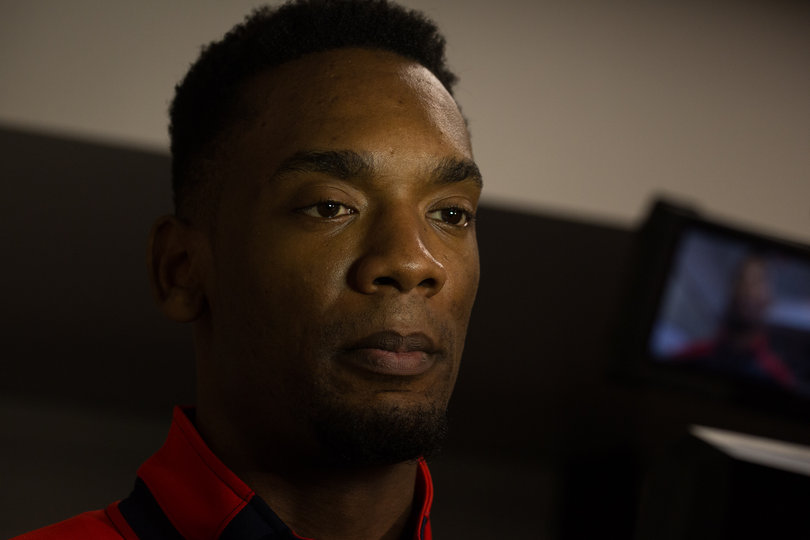 Dayton forward Dyshawn Pierre looks into a camera while being interviewed on Thursday.