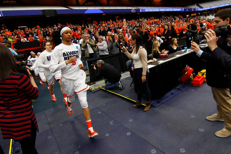 Syracuse players jog onto the court in the Carrier Dome against Albany.
