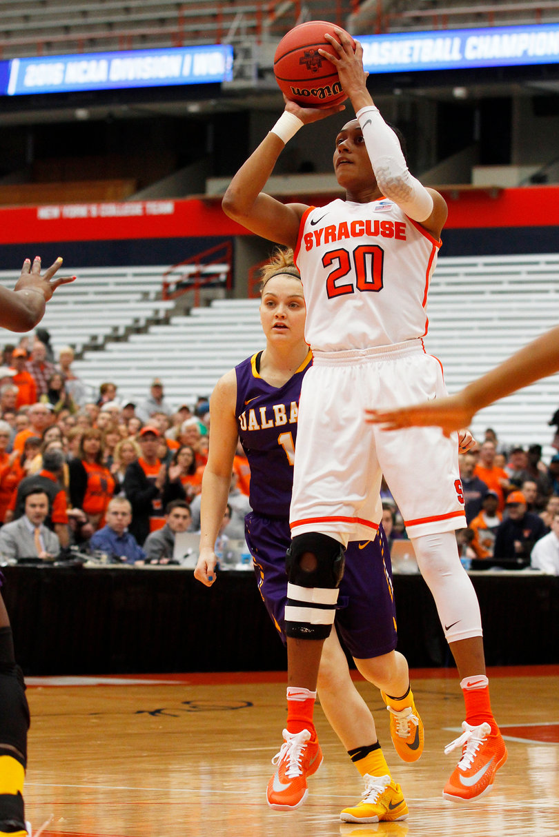 Sykes rises and fires during the first half. She scored 24 points for Syracuse to lead the Orange. 