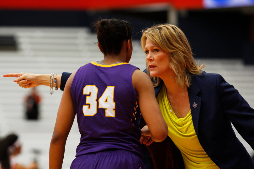 Albany coach Katie Abrahamson-Henderson instructs Cassandra Edwards.
