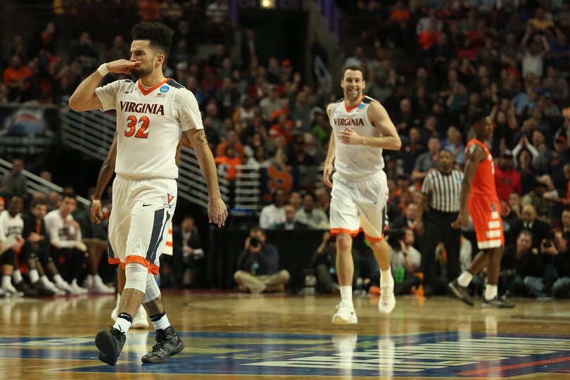 London Perrantes (32) hit five open 3-point looks in the first half to put the Cavaliers up.