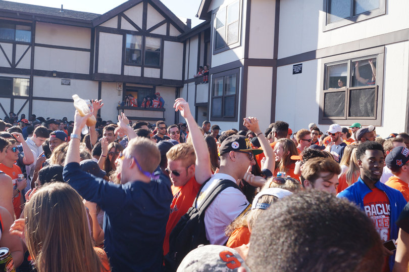 SU students party in Castle Court hours before the Syracuse men's and women's basketball teams each punched tickets to the Final Four. 