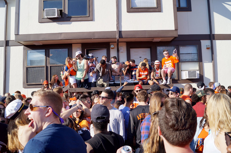 SU students party at Castle Court on Sunday prior to the Elite Eight games. The Syracuse men's basketball team topped Virginia, while the women's team beat Tennessee.