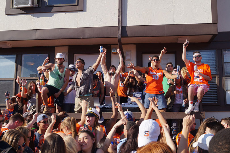 Students gather at Castle Court prior to the Syracuse men's and women's basketball teams playing in their respective Elite Eight games.