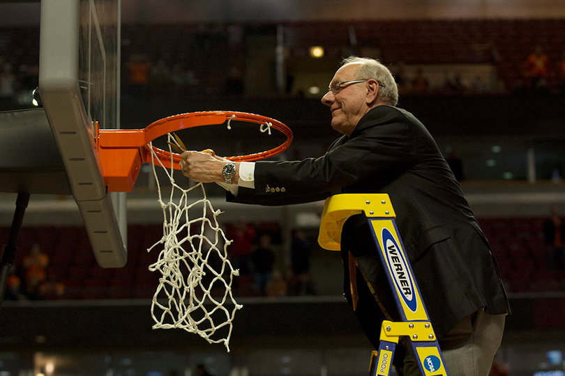 Jim Boeheim, in his 40th season as Syracuse head coach, was all smiles cutting down the net in the United Center.