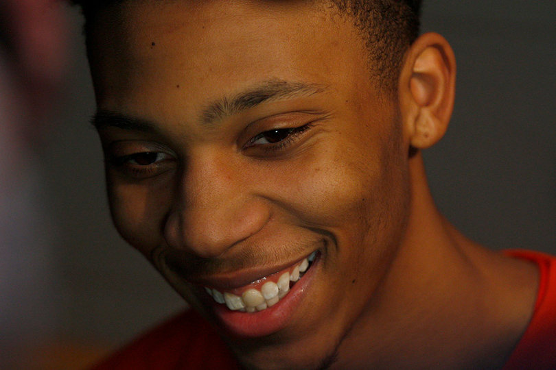Midwest Region star Malachi Richardson, who finished with 23 points on Sunday, smiles while talking to the media.