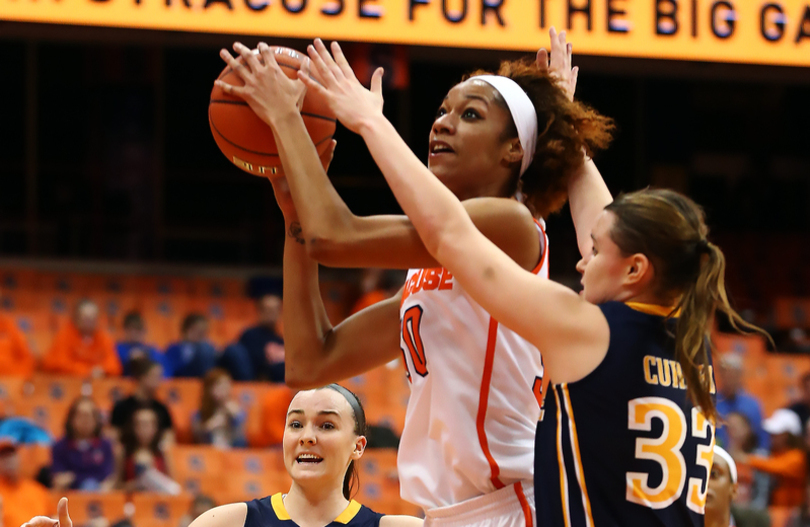 Tennessee’s Mercedes Russell and Bashaara Graves present another challenge in the post for Briana Day