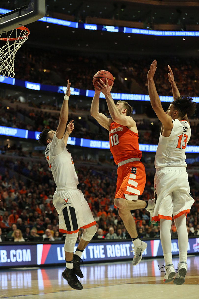 Cooney drives to the rim during the second half of Syracuse-Virginia. The senior finished with eight points.