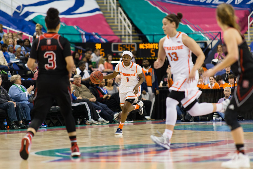 SU point guard Alexis Peterson brings the ball up the court. She scored 18 points despite having four fouls.
