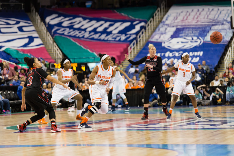 Sykes turns her attention as the ball flies from the hands of N.C. State's Miah Spencer.