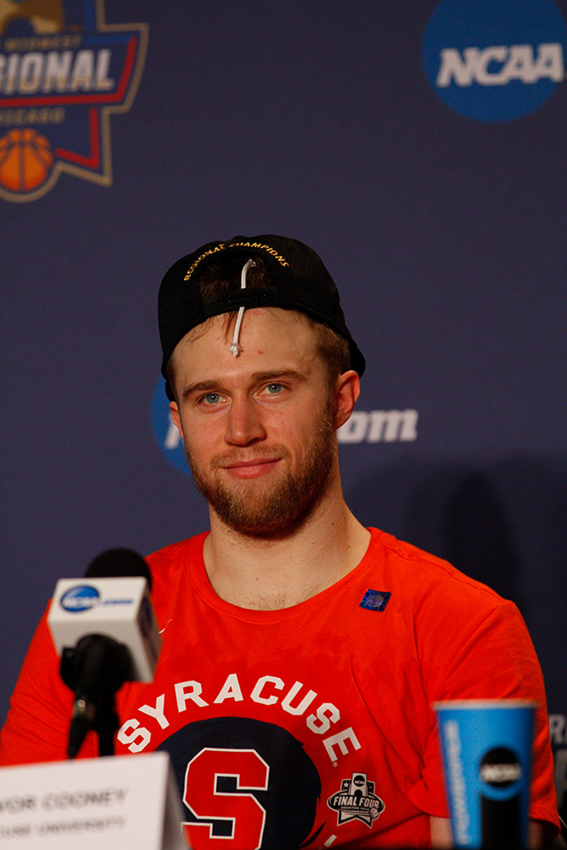 Trevor Cooney smiles while answering questions from the media following Syracuse's upset over No. 1 seed Virginia.