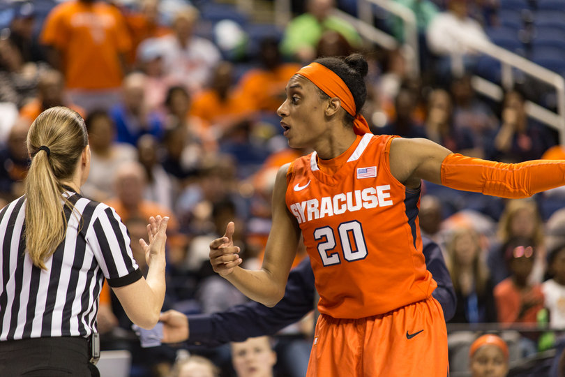 Sykes pleads her case to a nearby referee. She had four fouls in the Syracuse victory.