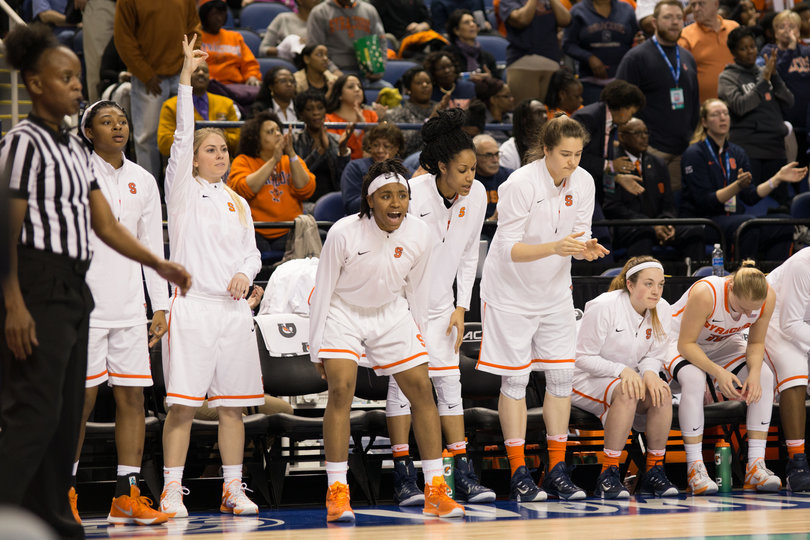 Savannah Crocetti holds three fingers up in the air. Syracuse hit 12 3-pointers and improved to 9-0 when knocking down that many 3s.