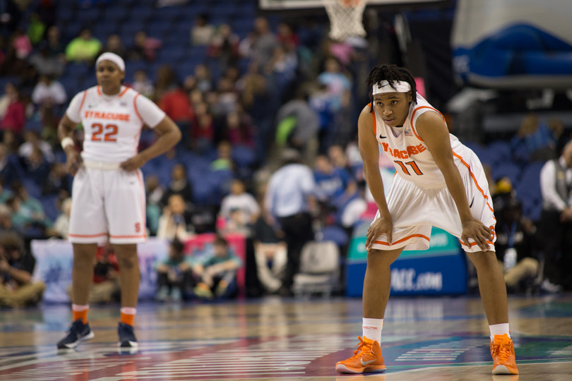 Cornelia Fondren leans over with her hands on her knees. She scored eight points in the fourth quarter to guide SU to the victory.