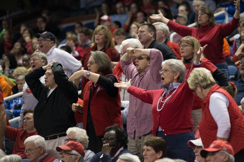 N.C. State fans react to the up-and-down game. Four Wolfpack players had four or five fouls.