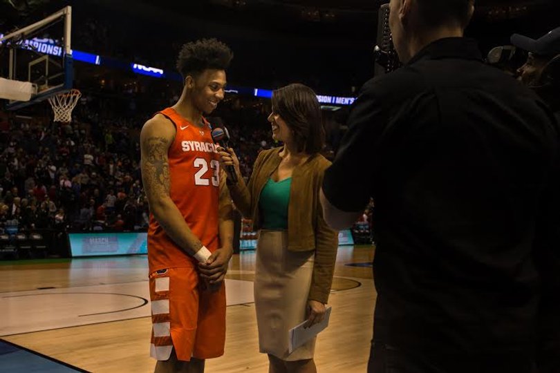 Richardson speaks with CBS sideline reporter Dana Jacobson after the Orange's victory. 