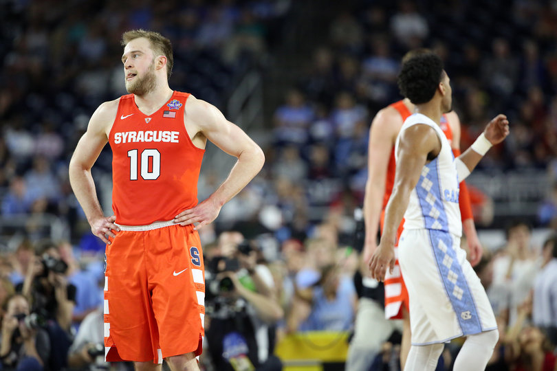 Cooney puts his hands on his hips and licks his lips. The senior shot 4-for-8 from 3 in his last game ever for Syracuse. 