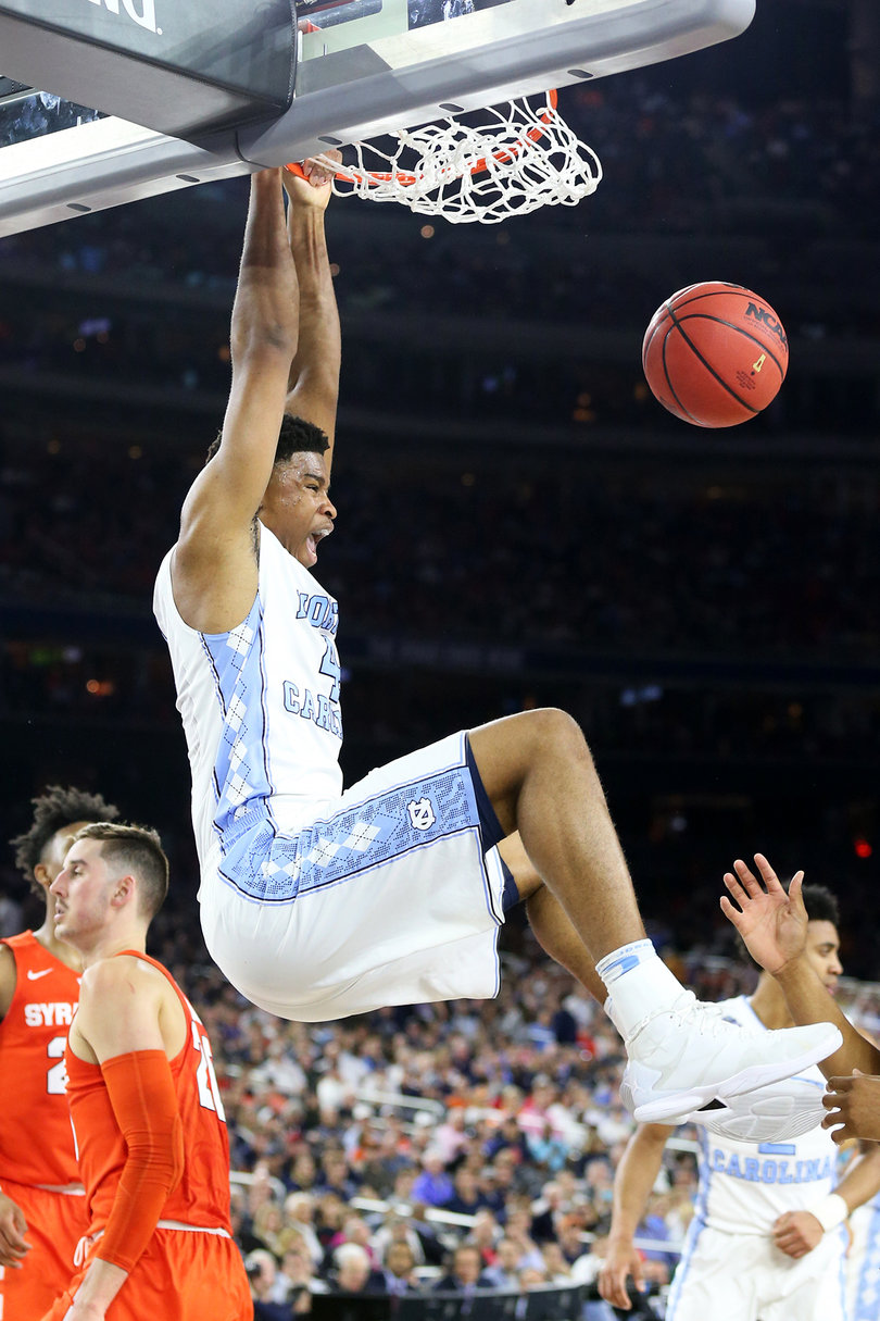 UNC forward Isaiah Hicks throws down a thunderous dunk on Saturday. Hicks accrued four fouls early and only scored six points. 