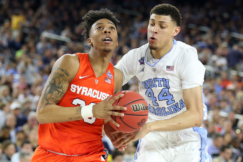 Richardson and Jackson battle as the former moves to the basket. After the game, Richardson reportedly refused to talk about whether he'd head to the NBA. 