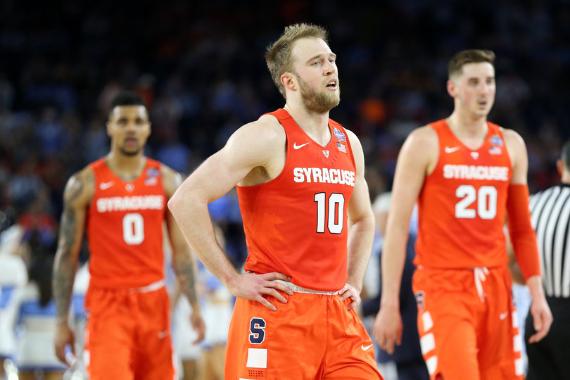 Gbinije, Cooney and Tyler Lydon (20) walk to the bench. Lydon and Gbinije went a combined 8-for-27 and scored 20 points for SU on Saturday. 