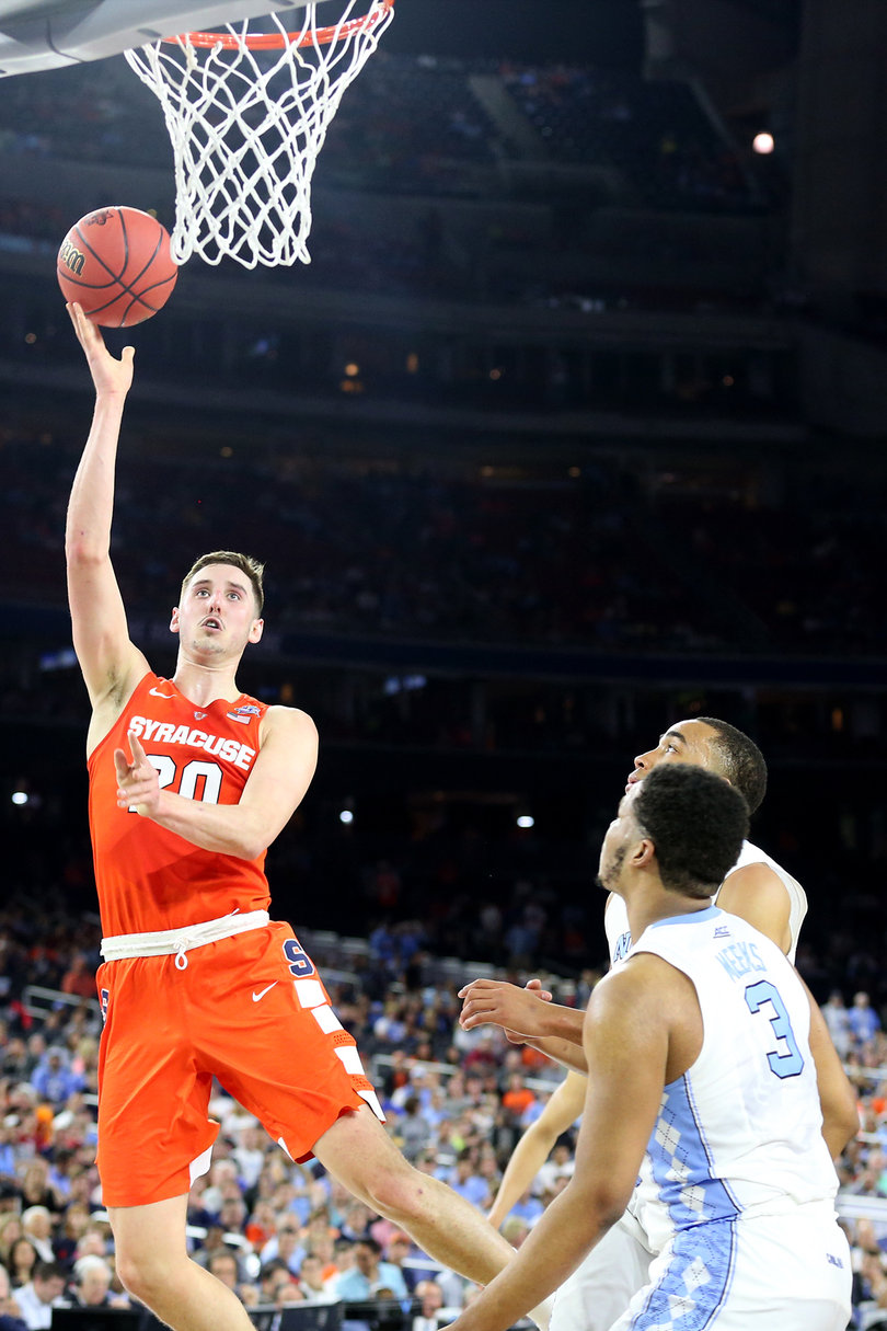 Lydon puts up a layup as Meeks and Johnson look on. Lydon shot just 3-of-9 from the field. 
